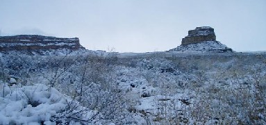 Photo of Fajada Butte in snow